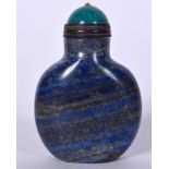 A CHINESE LAPIS LAZULI SNUFF BOTTLE, formed with a turquoise coloured stopper. 7.5 cm high.