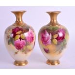 A PAIR OF ROYAL WORCESTER FINE AMPHORA VASES C1923. 13.5 cm high.