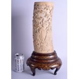 A LARGE 19TH CENTURY JAPANESE MEIJI PERIOD CARVED IVORY TUSK VASE decorated with elephants and figu