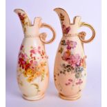 AN ANTIQUE ROYAL WORCESTER EWER Shape 1065, C1895, together with another C1898. 16 cm high. (2)