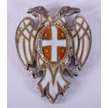 A 19TH CENTURY CONTINENTAL ENAMELLED EAGLE possibly Prussian. 1.7 grams. 1 cm x 1 cm.