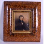 A QUEEN ANNE OYSTER WOOD FRAME containing a late Regency watercolour of a gentleman. Frame 30 cm x