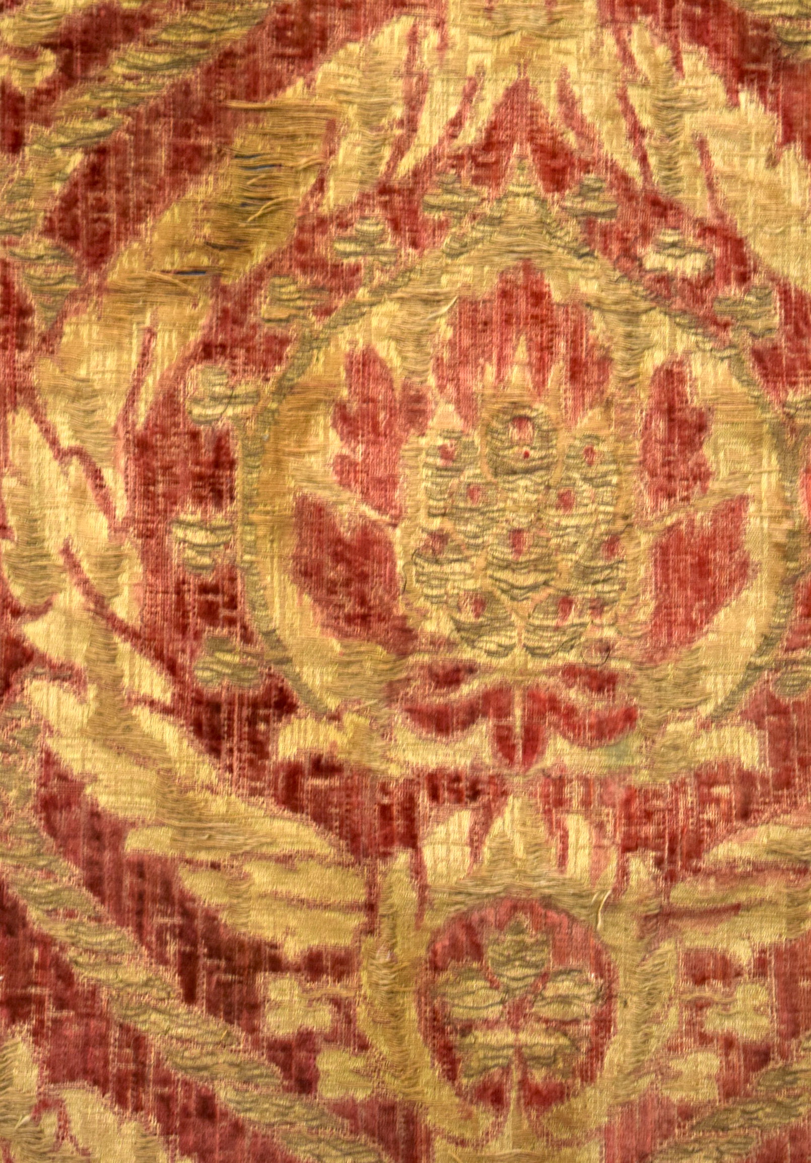 A RED GROUND OTTOMAN ISLAMIC TEXTILE, decorated with bold foliage. 89 cm x 53.5 cm. - Image 2 of 3