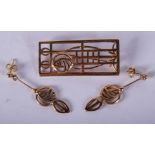 A SUITE OF 9CT GOLD MACKINTOSH JEWELLERY. 8.8 grams. (3)