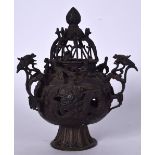 A CHINESE PIERCED BRONZE HANGING CENSER, formed with dragon handles. 28 cm high.