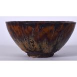A CHINESE HARESFOOT TYPE PORCELAIN BOWL, decorated with a mottled drip glaze. 12 cm wide.