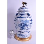 A LARGE 19TH CENTURY CHINESE BLUE AND WHITE BALUSTER JAR AND COVER converted to a lamp, painted wit