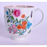 AN 18TH CENTURY WORCESTER COFFEE CUP with unusual heavy enamelled flowers. 6.5 cm high.