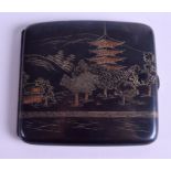 A JAPANESE TAISHO PERIOD SILVER CIGARETTE CASE decorated with a pagoda. 8.5 cm x 7.75 cm.