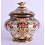 A JAPANESE TAISHO PERIOD NORITAKE JAR AND COVER painted with floral sprays. 15 cm x 15 cm.