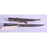 AN 18TH/19TH MIDDLE EASTERN SILVER AND IVORY DAGGER with fine quality embossed scabbard and engrave