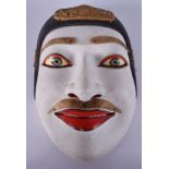 A JAPANESE TAISHO PERIOD PAINTED WOODEN MASK. 14 cm x 18 cm.