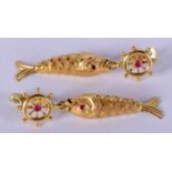 A PAIR OF 18CT GOLD AND RUBY FISH EARRINGS. 4.3 grams. 3.25 cm long.