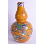 A 19TH CENTURY CHINESE SANCAI GLAZED POTTERY DOUBLE GOURD VASE Late Qing. 32 cm high.