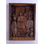 A CHARMING ARTS ANDS CRAFTS CARVED WOODEN BRASS MOUNTED BLOCK PANEL depicting the Magna Carta