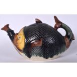 AN EARLY 20TH CENTURY MAJOLICA PORCELAIN TEA POT IN THE FORM OF A FISH, the tail forming the handle