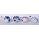 A GROUP OF FOUR CHINESE BLUE AND WHITE PORCELAIN TEA POTS, decorated with foliage. (4)