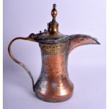 AN EARLY ISLAMIC MIDDLE EASTERN COPPER AND BRASS EWER decorated with foliage and motifs. 28 cm high