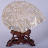 AN EARLY 20TH CENTURY CHINESE CARVED MOTHER OF PEARL SHELL Qing. Shell 21 cm x 15 cm. (2)