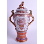 A RARE 18TH CENTURY CHINESE EXPORT FAMILLE ROSE VASE AND COVER Qianlong, with unusual dragon handle
