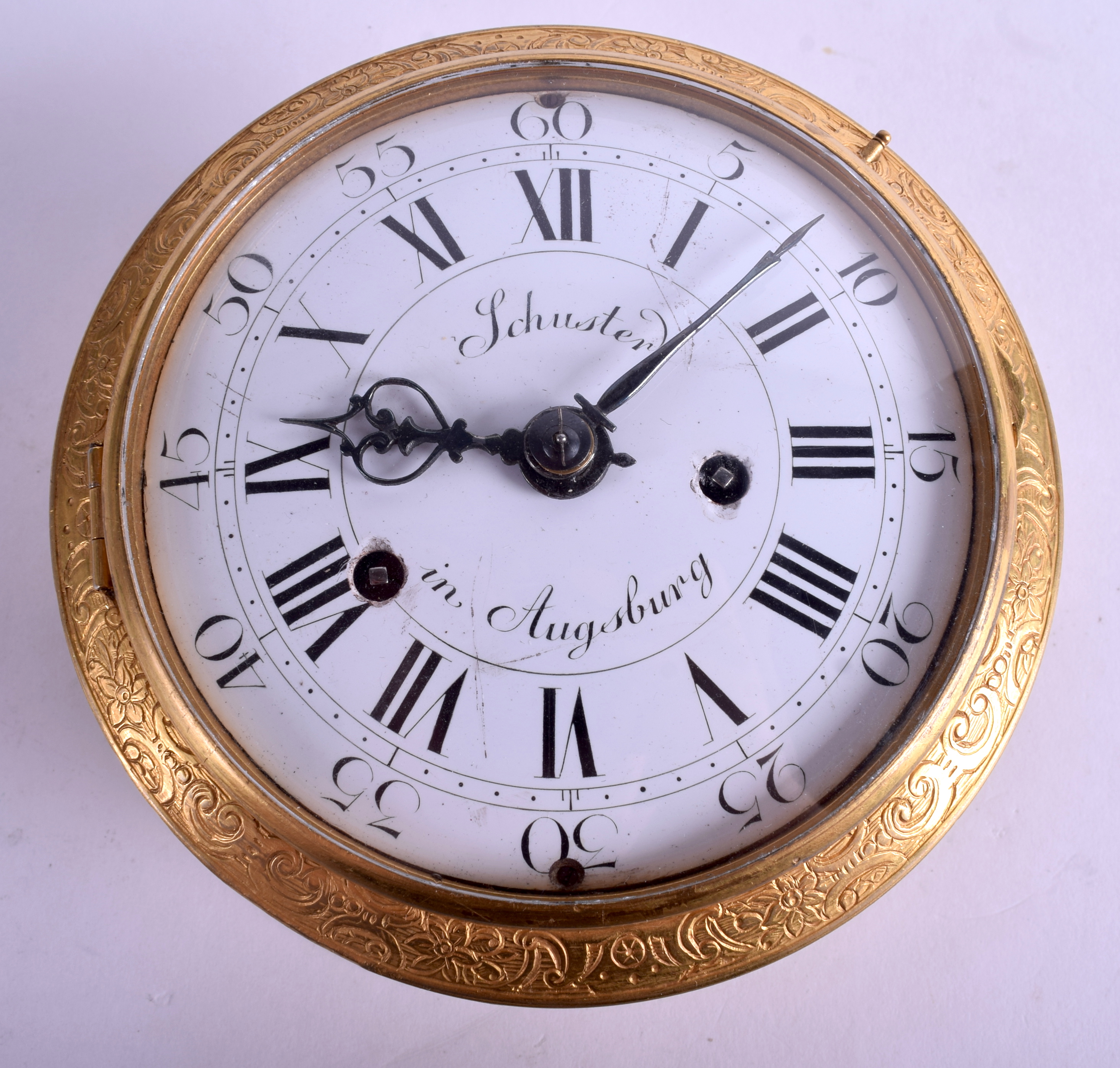 A RARE ANTIQUE GERMAN AUGSBURG GILT METAL STRIKING HORIZONTAL TABLE CLOCK by Schuster, the case dec