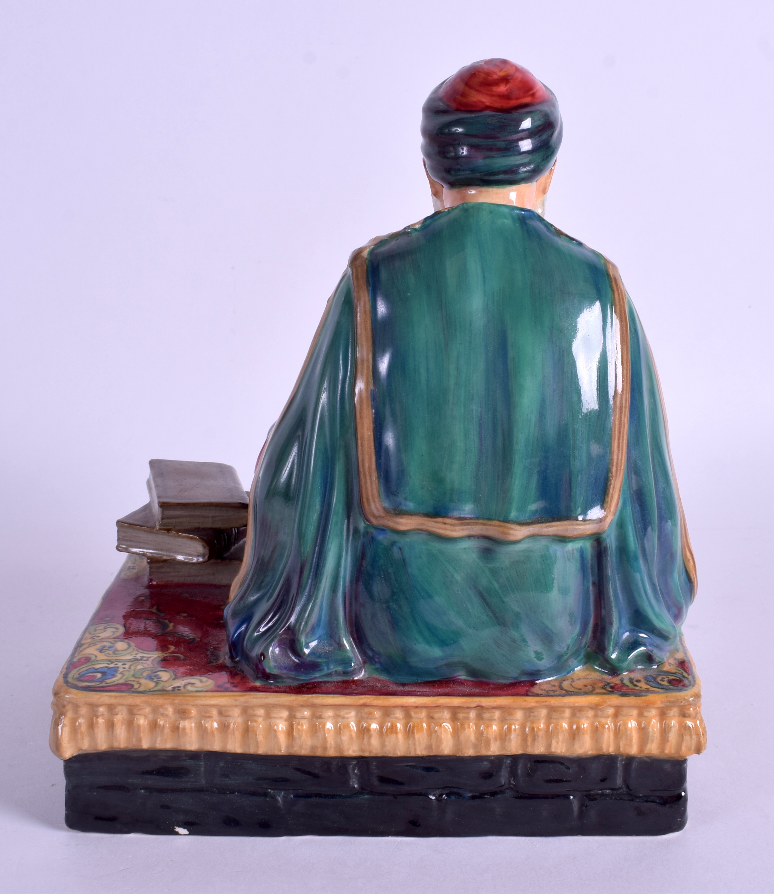 A RARE PORCELAIN REGINALD JOHNSON STUDIO POTTERY FIGURE depicting Tunisian Scholar of Law. 22 cm x - Image 2 of 3