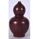 A CHINESE AUBERGINE GLAZED PORCELAIN VASE BEARING QIANLONG MARKS, double gourd in shape. 24 cm high