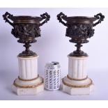 A PAIR OF MID 19TH CENTURY FRENCH BRONZE ORMOLU AND MARBLE PEDESTAL URNS Attributed to Auguste Nico