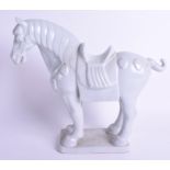 AN EARLY 20TH CENTURY CHINESE BLANC DE CHINE FIGURE OF A HORSE. 30 cm x 25 cm.