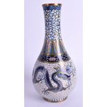 AN EARLY 20TH CENTURY CHINESE CLOISONNE ENAMEL VASE decorated with a dragon amongst crashing waves.