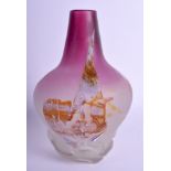 A STYLISH EUROPEAN PINK AND CLEAR GLASS VASE overlaid with abstract decoration. 20 cm high.