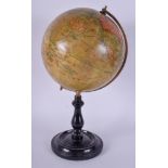 A RARE ANTIQUE 8 INCH GEOGRAPHIA TERRESTRIAL GLOBE with railway and steamer routes. 39 cm high.