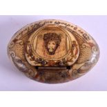 AN 18TH CENTURY ITALIAN CARVED HORN SNUFF BOX carved with a portrait of Christ and a motto. 7.5 cm