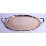A LARGE GEORGE III TWIN HANDLED SERVING TRAY. London 1815. 137.5 oz. 72 cm x 45 cm.