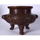 A HUGE CHINESE BRONZE CENSER BEARING QIANLONG MARKS, formed with mask head handles. 29.5 cm x 47 cm