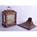 A RARE REGENCY CARVED TORTOISESHELL BRACKET CLOCK with matching bracket, the dial engraved with fol