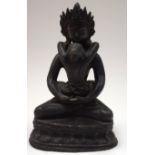 A CHINESE SINO TIBETAN BRONZE BUDDHA I, formed seated upon a double beaded lotus throne. 21 cm high