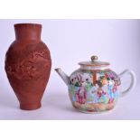A 19TH CENTURY CHINESE CANTON FAMILLE ROSE TEAPOT AND COVER Qing, together with a Japanese Redware