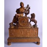 A LARGE EARLY 19TH CENTURY FRENCH EMPIRE ORMOLU MANTEL CLOCK decorated with classical figures withi