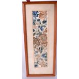 AN EARLY 20TH CENTURY CHINESE SILK EMBROIDERED PANEL, depicting fish amongst foliage. 31 cm x 8 cm.