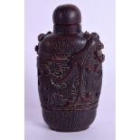 AN EARLY 20TH CENTURY CHINESE CARVED BUFFALO HORN SNUFF BOTTLE AND STOPPER Late Qing, carved with c
