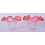 A PAIR OF 1920S PINK VASELINE GLASS SHADES. 14 cm x 12 cm.