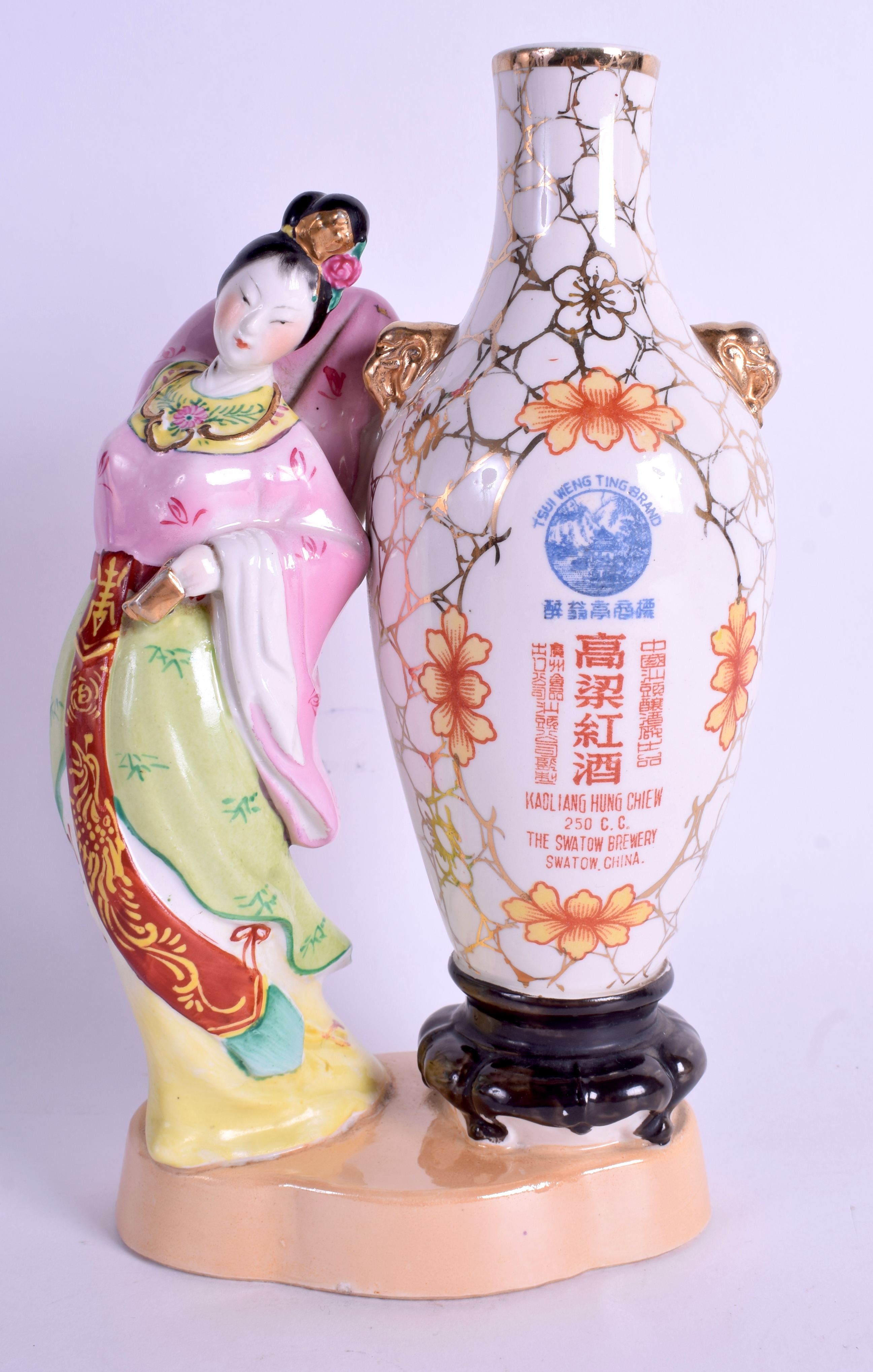 A RARE 1950S CHINESE ADVERTISING FIGURE The Swatow Brewery, China. 23.5 cm high.