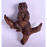 A SMALL LATE 19TH CENTURY BAVARIAN BLACK FOREST BEAR COAT HOOK. 18 cm x 20 cm.