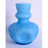 AN UNUSUAL EDWARDIAN BLUE VASELINE GLASS CRIMPED VASE. 23 cm high.