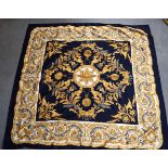 A VINTAGE VERSACE SILK SCARF OR SHAWL, decorated with foliage and hanging pocket watches. 112 cm x 1
