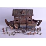 AN ANTIQUE GERMAN CARVED AND PAINTED WOOD NOAH'S ARK containing numerous animals. 42 cm x 25 cm. (q