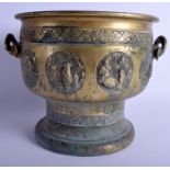 A LARGE 19TH CENTURY JAPANESE MEIJI PERIOD BRONZE CENSER decorated with panels of figures. 24 cm x