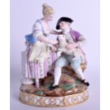 A 19TH CENTURY MEISSEN FIGURE OF A MALE AND FEMALE modelled holding a lamb. 20 cm x 12 cm.
