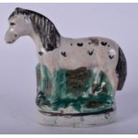 A 19TH CENTURY STAFFORDSHIRE FIGURE OF A HORSE. 10 cm x 10 cm.